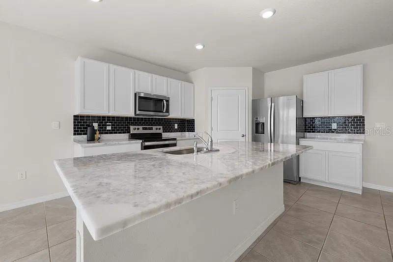 5 bedroom Single Family Residence at 17249 Wheatberry Boulevard, Rye Crossing, Parrish — photo 4