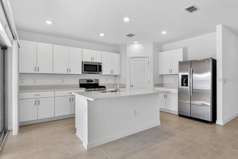 4 bedroom Single Family Residence at 217 Streamwater Way, Waterstone, Groveland — photo 4