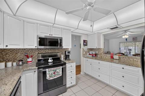 907 Bluewater Drive, Sun City Center FL - photo 12 of 36