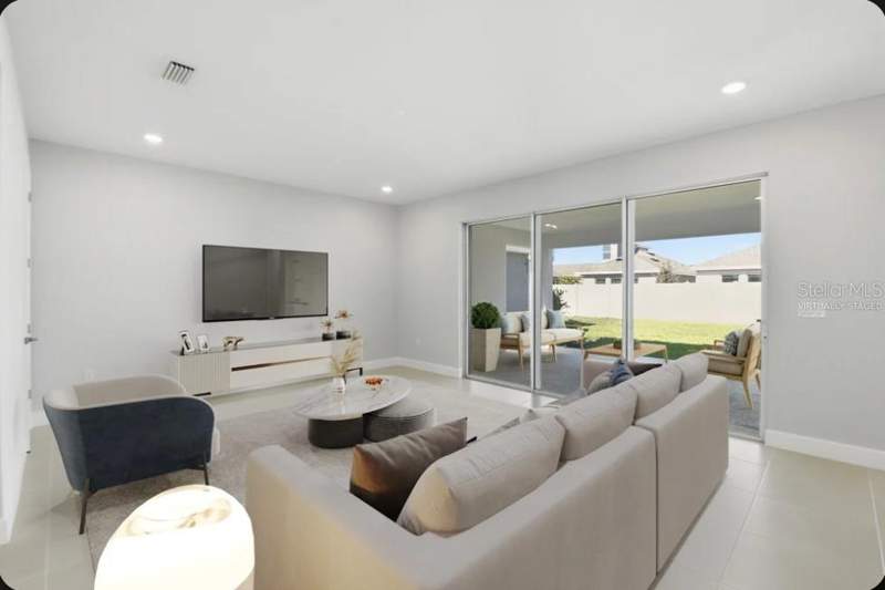 5 bedroom Single Family Residence at 15993 Honey Harvest Street, Harvest At Ovation, Winter Garden — photo 3