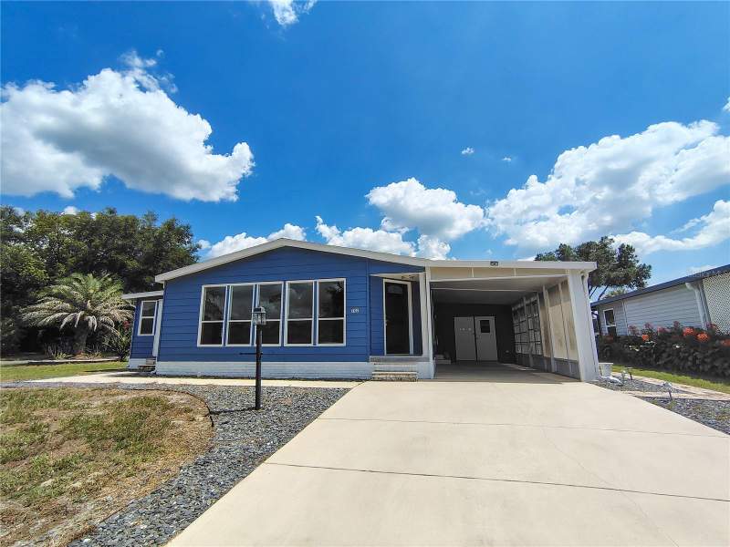 702 TURNBERRY LANE home for sale in Lady Lake Orange Blossom Gardens