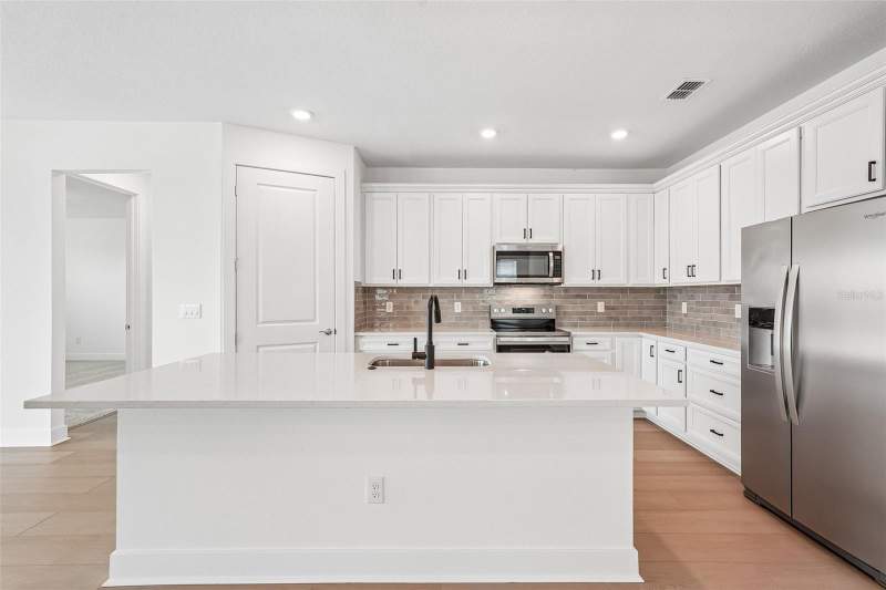 4 bedroom Single Family Residence at 9927 Johnson Oaks Glen, Seaire, Parrish — photo 3
