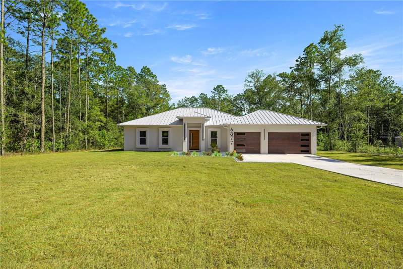 4 bedroom Single Family Residence at 6877 SW 131st Circle, Rolling Hills Un 03, Ocala — photo 2