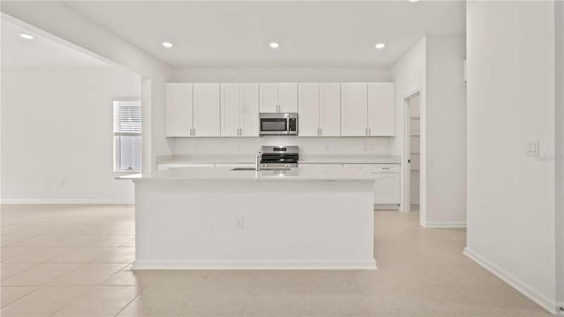 4 bedroom Single Family Residence at 3323 Addison Boulevard, Springhead Lakes 50S, St Cloud — photo 3