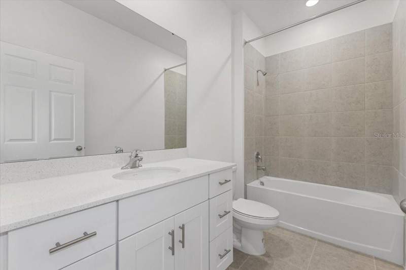 4 bedroom Single Family Residence at 9124 Wildlight Trail, Highfield At Twisted Oaks, Wildwood — photo 5