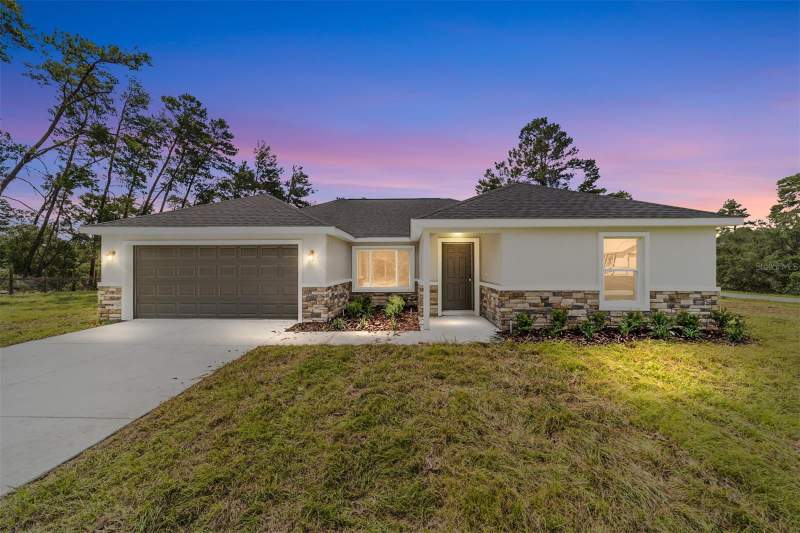 4 bedroom Single Family Residence at 22060 SW Neptune Boulevard, Rainbow Lakes Estate, Dunnellon — photo 2