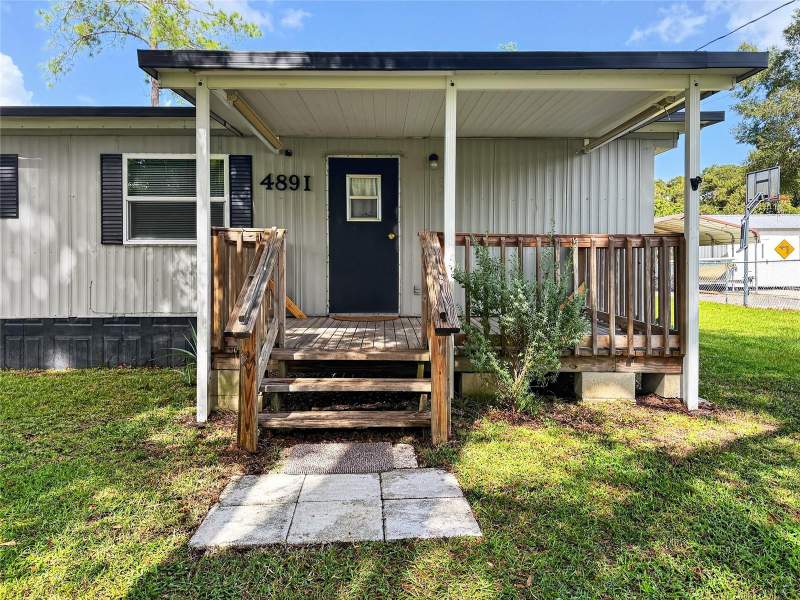 2 bedroom Mobile Home at 4891 SE 146th Place, Breezewood Estate, Summerfield — photo 2