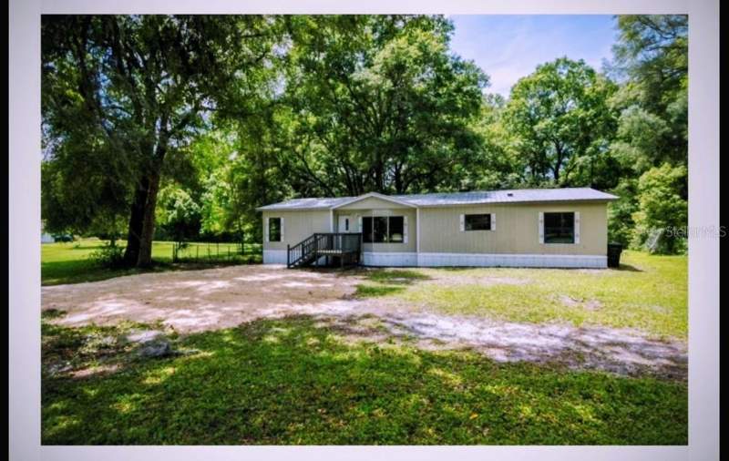 3 bedroom Manufactured Home at 14902 NE 142nd Street, Brannings 2nd Add To Waldo, Waldo — photo 2