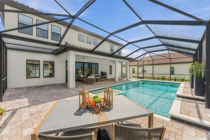 5 bedroom Single Family Residence at 14985 Rider Pass Drive, Hinton Hawkstone Ph 2B1, Lithia — photo 4