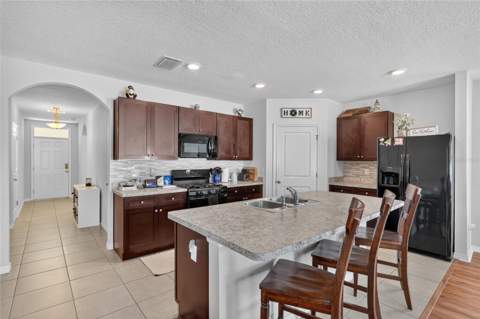 9785 Pepper Tree Trail, Wildwood FL - photo 13 of 44