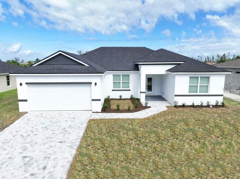 4 bedroom Single Family Residence at 1979 E Chapel Drive, Deltona Lakes Unit 65, Deltona — photo 2