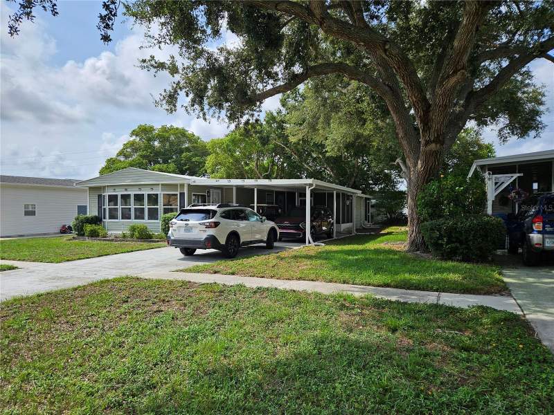 2 bedroom Manufactured Home at 217 Lake Tarpon Drive #24, Lake Tarpon Mobile Home Village, Palm Harbor — photo 2