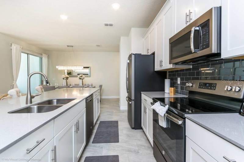 4 bedroom Townhouse at 1581 Sandbagger Drive, Stoneybrook South Ph J-2 & J-3, Davenport — photo 5
