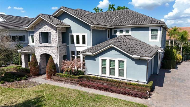5 bedroom Single Family Residence at 1316 Estancia Woods Loop, Estancia/Windermere, Windermere — photo 2