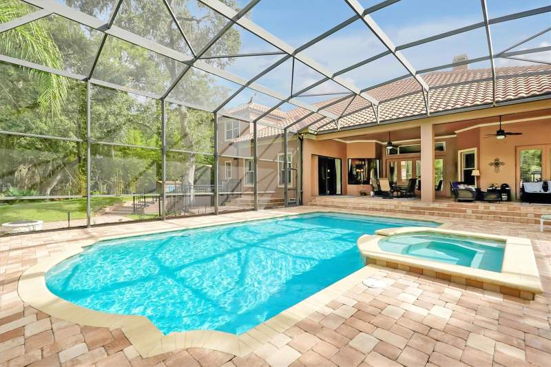 5 bedroom Single Family Residence at 12012 RAMBLING OAK BOULEVARD, LIVE OAK ESTATES, ORLANDO — photo 4
