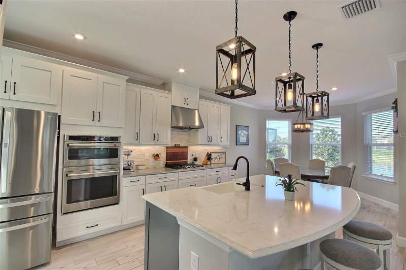 4 bedroom Single Family Residence at 10563 Piedra Dr, Artisan Lakes Eaves Bend Ph I Sp A-K, Palmetto — photo 3
