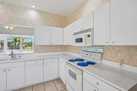 1104 Villeroy Drive, Sun City Center FL - photo 7 of 68
