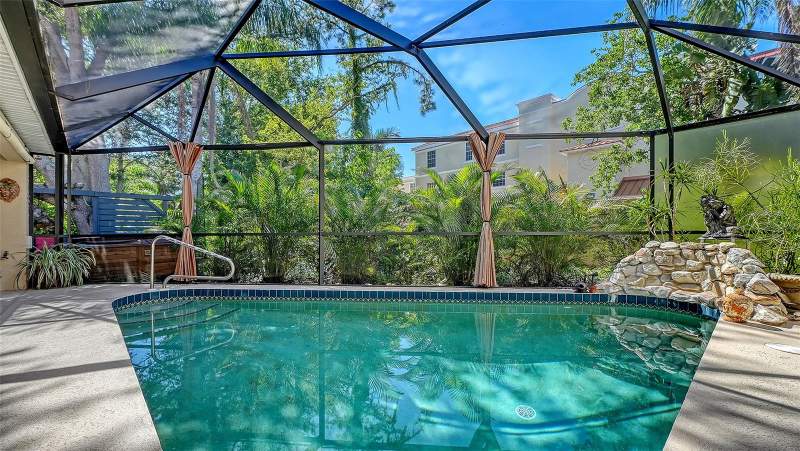 4 bedroom Single Family Residence at 455 Oak Point Road, Blackburn Point Woods, Osprey — photo 4