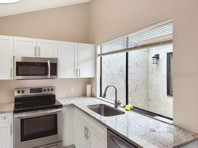 2 bedroom Single Family Residence at 12233 Saddle Strap Row, Beacon Woods Village, Hudson — photo 4