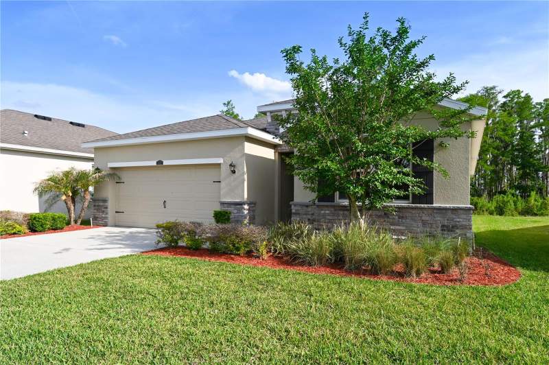 4 bedroom Single Family Residence at 1052 Manzanar Place, Union Park Ph 6A 6B & 6C, Wesley Chapel — photo 2