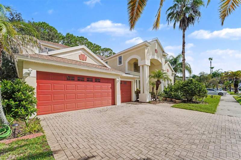 5 bedroom Single Family Residence at 10409 CANARY ISLE DRIVE, CORY LAKE ISLES, TAMPA — photo 1