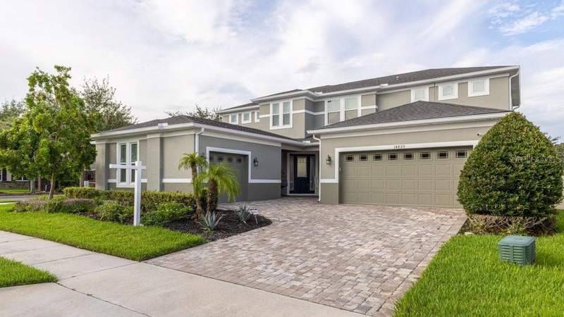 5 bedroom Single Family Residence at 14825 ELLINGSWORTH LANE, OXFORD CHASE, WINTER GARDEN — photo 1