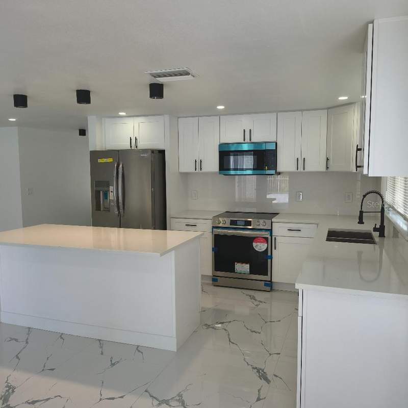 4 bedroom Single Family Residence at 7019 Fountain Avenue, Townn Country Park Unit 28, Tampa — photo 3