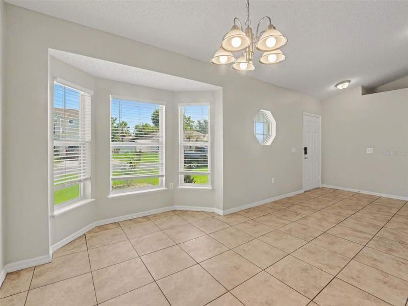 4 bedroom Single Family Residence at 212 CANTERBURY COURT, POINCIANA VILLAGE 2 NBHD 1, KISSIMMEE — photo 4