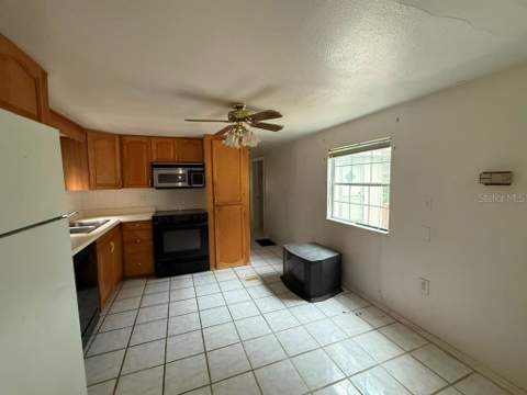 27416 Walnut Avenue, Okahumpka FL - photo 13 of 45