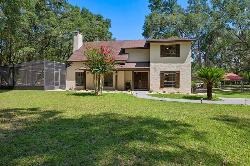 5 bedroom Single Family Residence at 22110 SW 15th Avenue, Hunt Estates, Newberry — photo 3