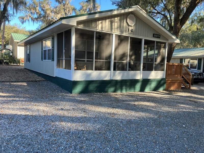 2 bedroom Single Family Residence at 25079 NE 140th Loop, Salt Spgs Resort The Cottages Condo, Salt Springs — photo 2