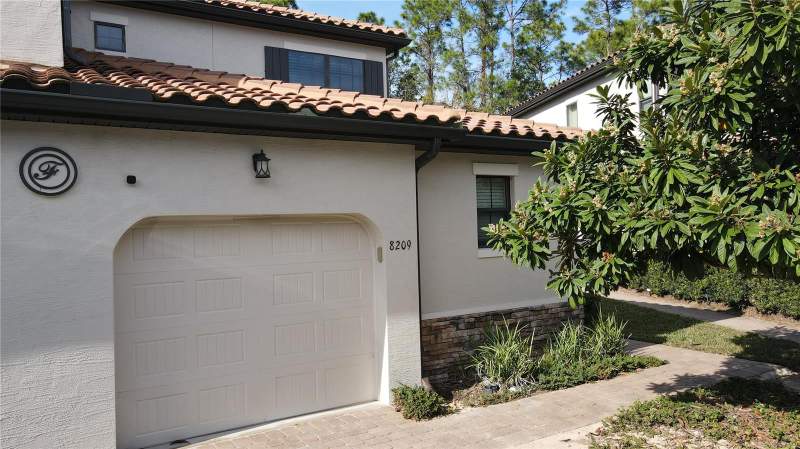 4 bedroom Townhouse at 8209 ROSEVILLE ROAD, FOUNTAINS AT CHAMPIONSGATE PH 1 REP, DAVENPORT — photo 1