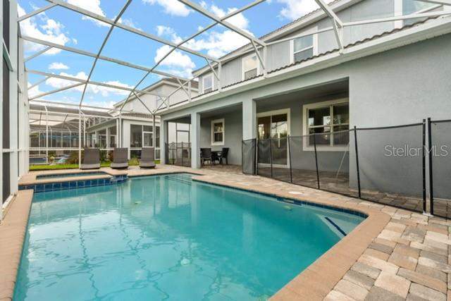 6 bedroom Single Family Residence at 8909 Stinger Drive, Stoneybrook South Ph J-2 & J-3, Champions Gate — photo 3