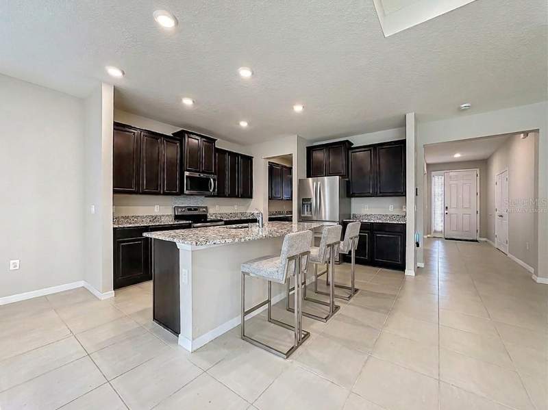 4 bedroom Single Family Residence at 13071 Brookside Moss Drive, Belmond Reserve, Riverview — photo 4