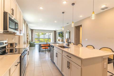148 Hilltop Bloom Loop, Haines City FL - photo 7 of 31