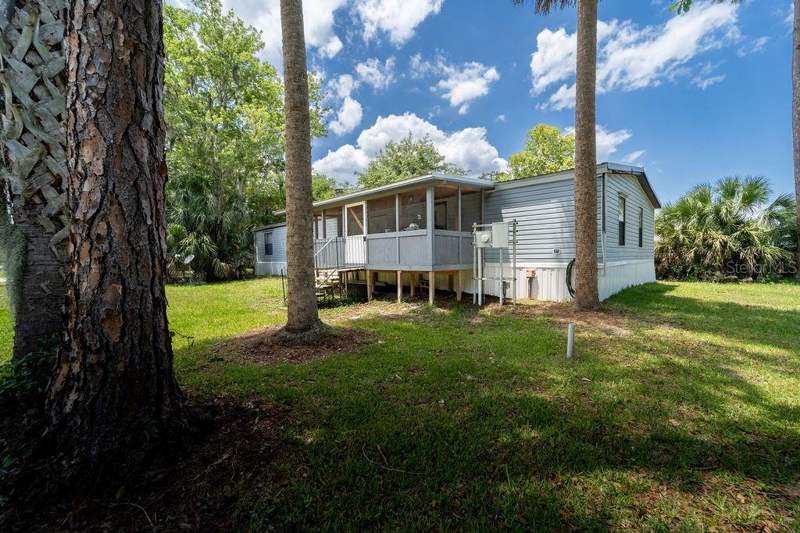 4 bedroom Manufactured Home at 24031 Armadillo Road, Astor Forest Campsites Unrec, Astor — photo 2