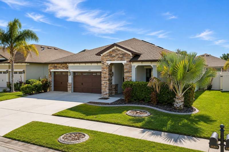 4 bedroom Single Family Residence at 1880 Tonka Terrace, Union Park Ph 3A, Wesley Chapel — photo 2