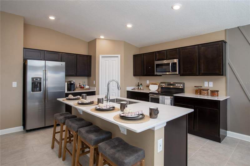 4 bedroom Single Family Residence at 5228 WORCHESTER DRIVE, KNIGHTSBRIDGE 50S, KISSIMMEE — photo 2
