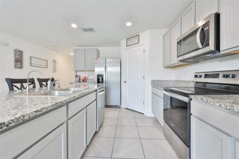 5244 Fiddle Fig Avenue, Wimauma FL - photo 7 of 51