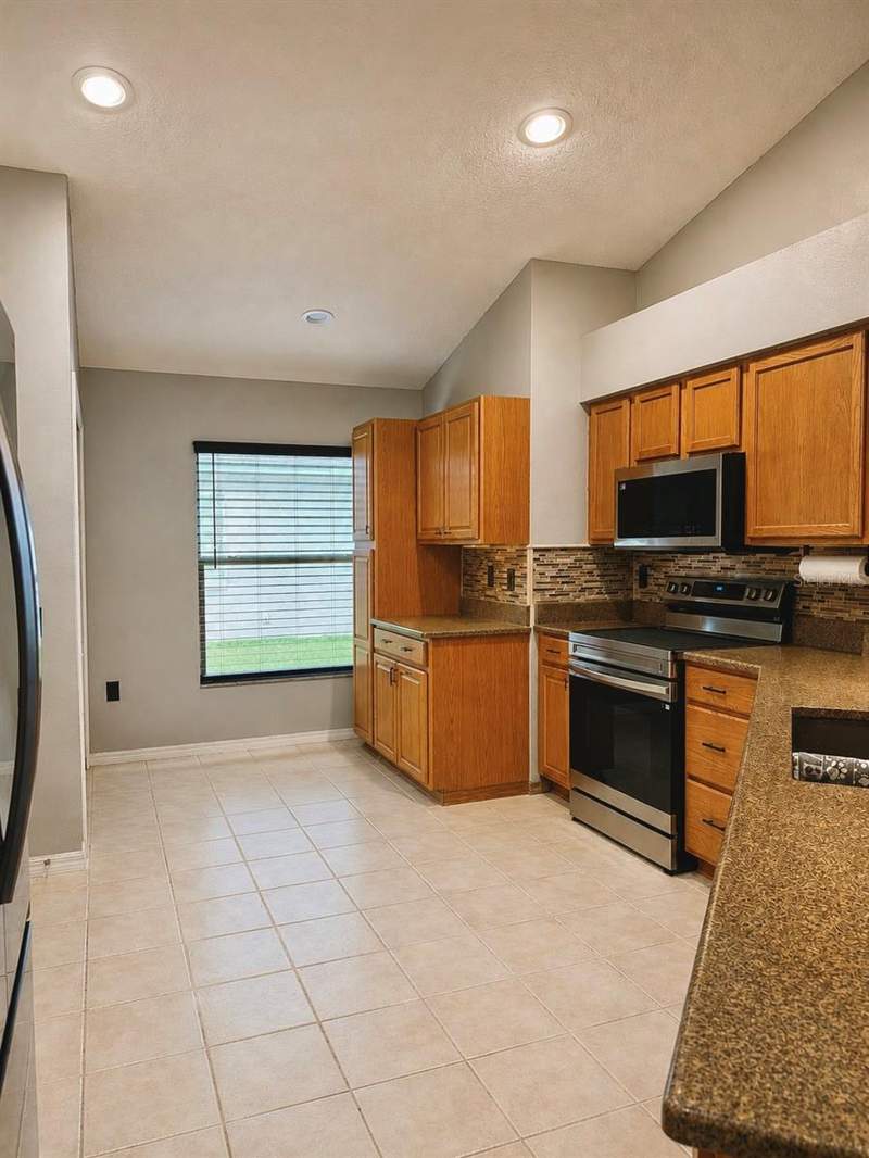 4 bedroom Single Family Residence at 4828 Wessex Way, Grand Oaks Ph 02 Units 06 & 08, Land O Lakes — photo 5