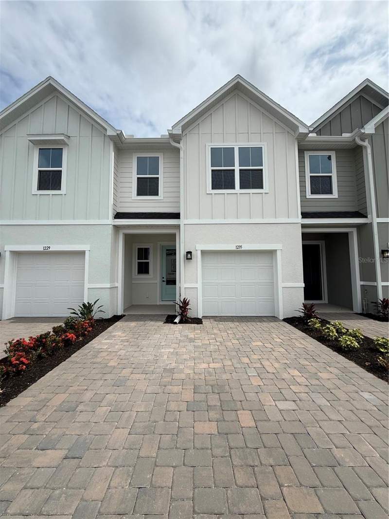 3 bedroom Townhouse at 1235 PINEYWOOD FIELD DRIVE, PINE POINTE, DAVENPORT — photo 1