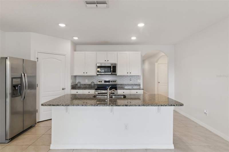 4 bedroom Single Family Residence at 2487 White Lilly Drive, Murano At Westside, Kissimmee — photo 4