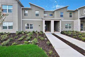 4 bedroom Townhouse at 392 OCEAN COURSE AVENUE, STONEYBROOK SOUTH NORTH PARCEL PH 1 PB 26 PGS 147-, CHAMPIONS GATE — photo 1