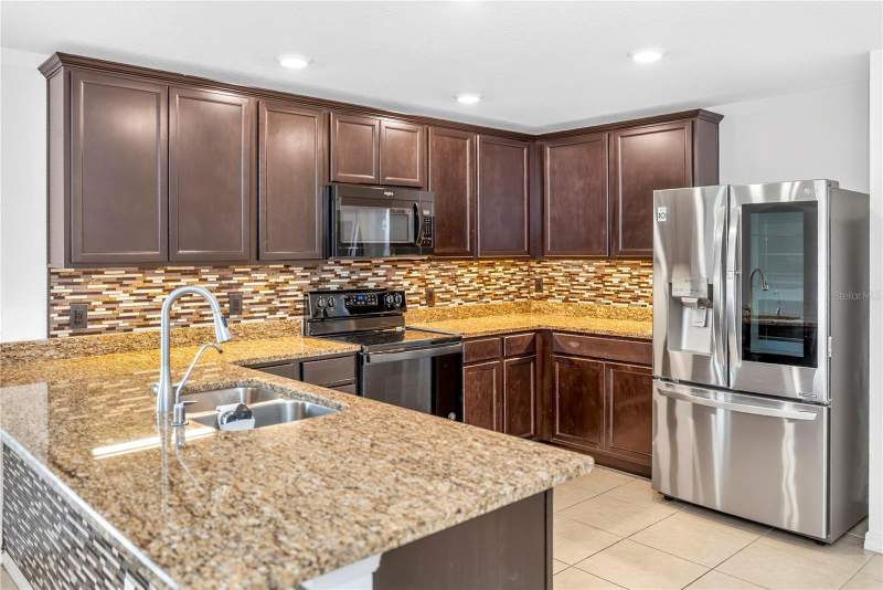 4 bedroom Single Family Residence at 1528 E Falmouth Avenue, Deltona Lakes Unit 03, Deltona — photo 4