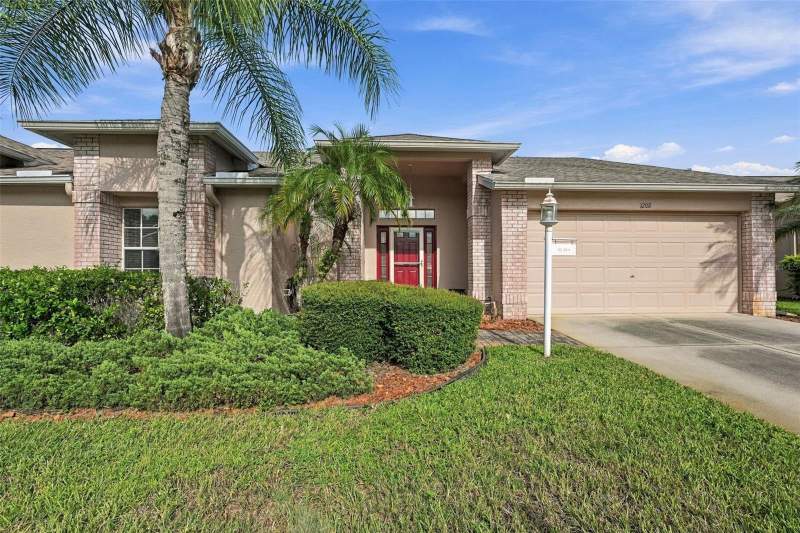 2 bedroom Villa at 1202 WOLFORD DRIVE, HERITAGE SPGS VILLAGE 11, TRINITY — photo 1