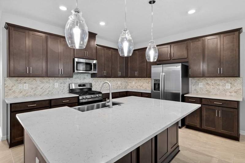 4 bedroom Single Family Residence at 5166 Goldfinch Drive, The Waters At Center Lake Ranch, St Cloud — photo 3