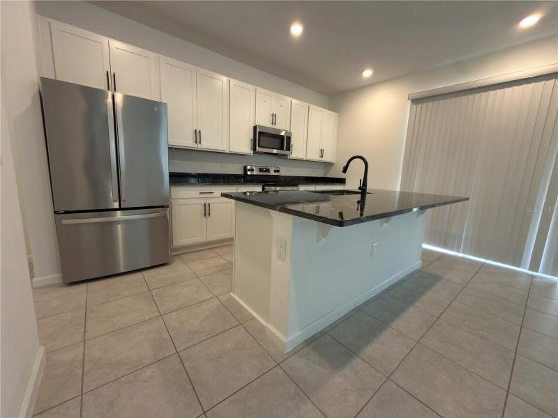 5 bedroom Single Family Residence at 1071 Sugarwood Street, Forest Lake Ph I, Davenport — photo 3