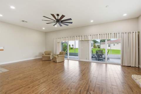 1097 Caravan Loop, Polk City FL - photo 7 of 59