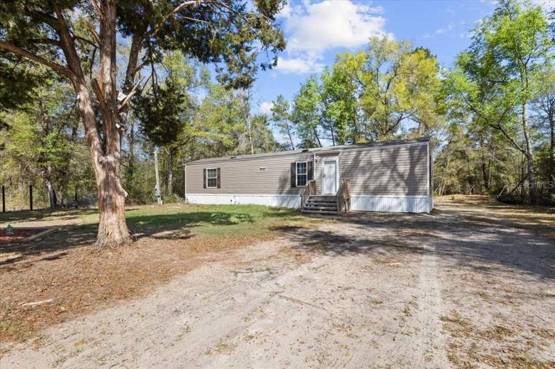 2 bedroom Manufactured Home at 11061 NE 65TH LANE, OAK RIDGE ESTATES, WILLISTON — photo 1