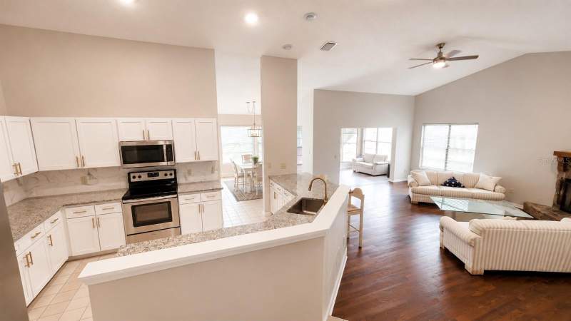 2 bedroom Single Family Residence at 13036 Topflite Court, Wood View At Meadow Oaks, Hudson — photo 4